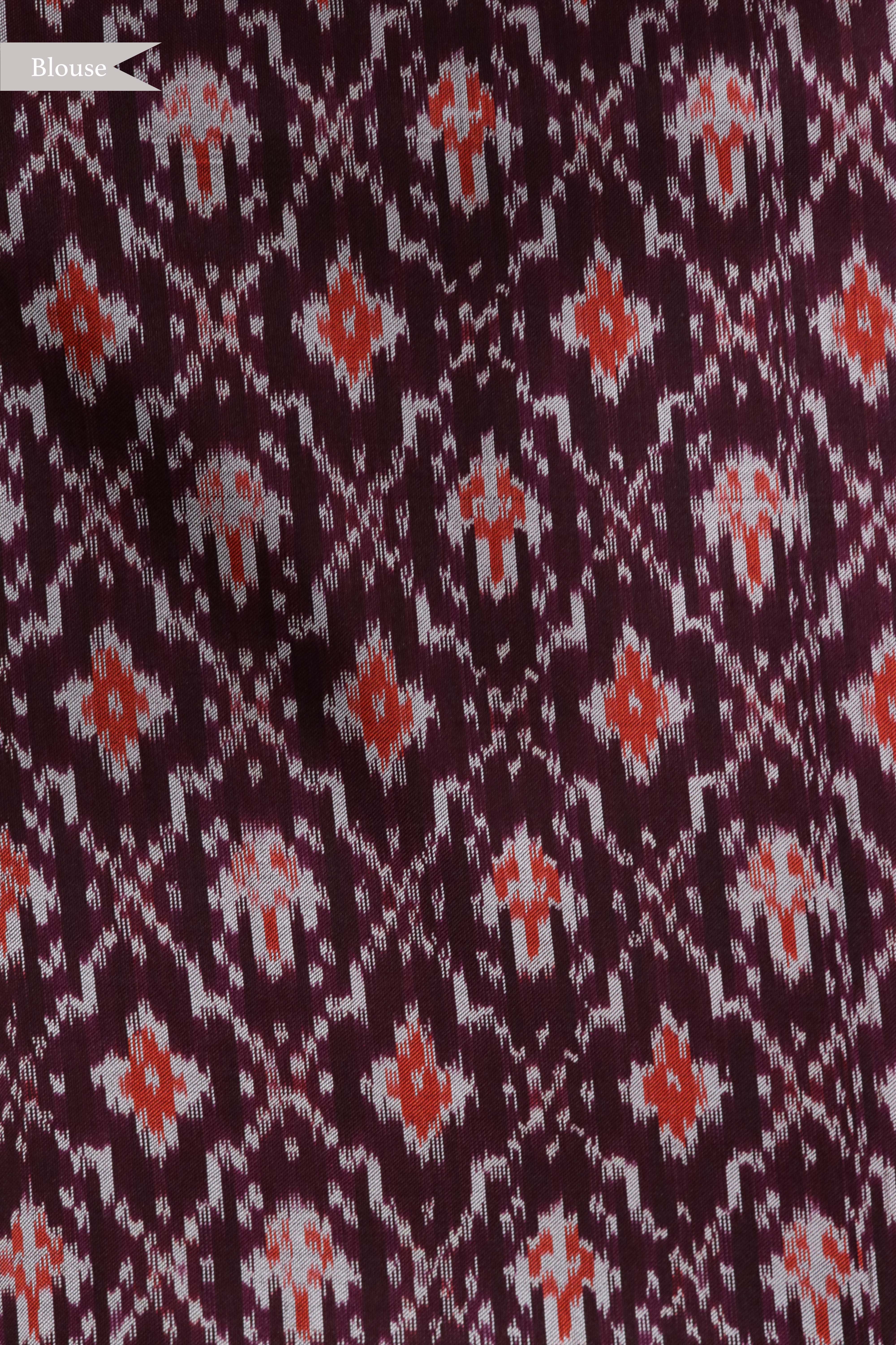Orange Printed Silk Saree with Ikat Border