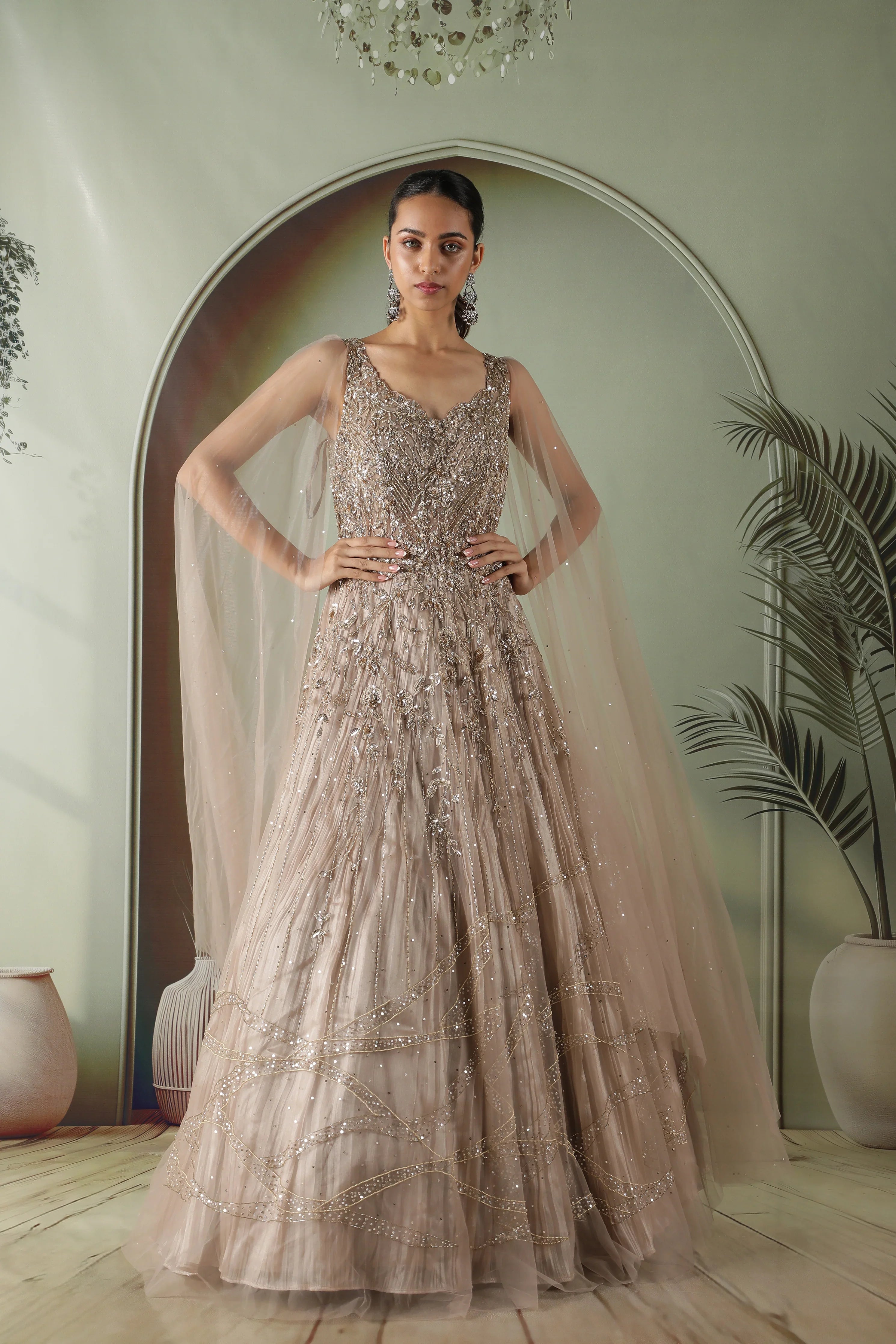 Dark Gold Embroidered Gown with Tissue Lining and Cape Sleeves - Mokshaa