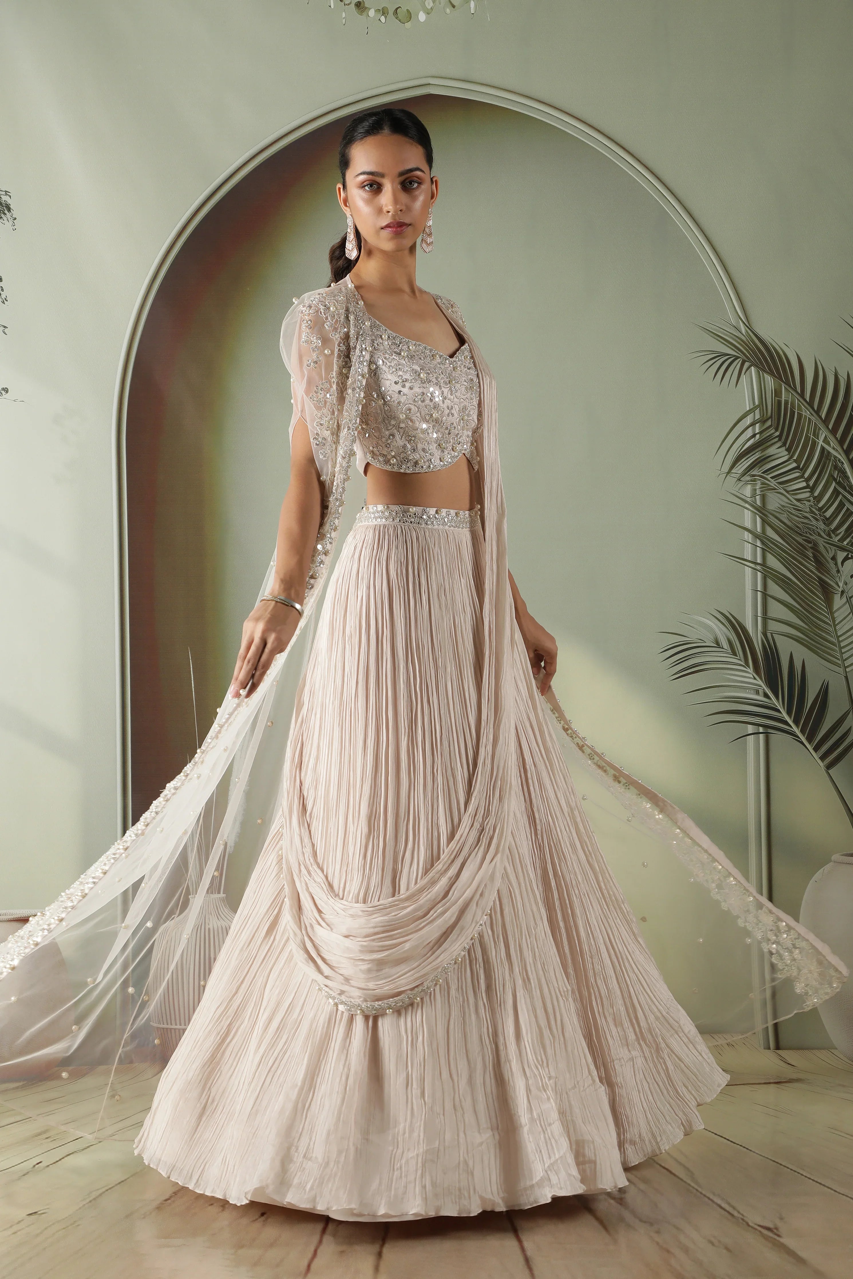 Ivory Silk Lehenga with Draped Dupatta and Embellished Net Cape - Mokshaa