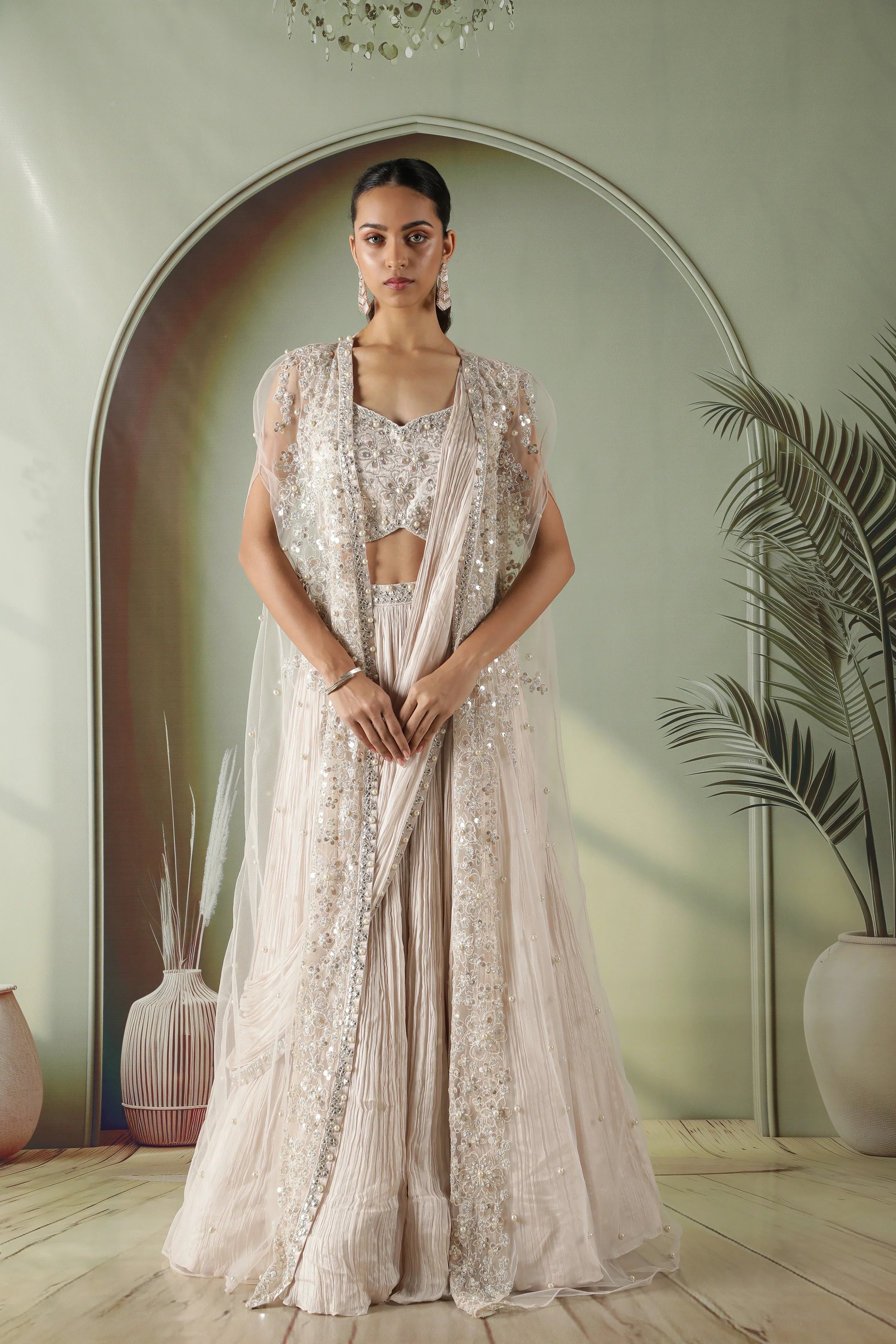 Ivory Silk Lehenga with Draped Dupatta and Embellished Net Cape - Mokshaa