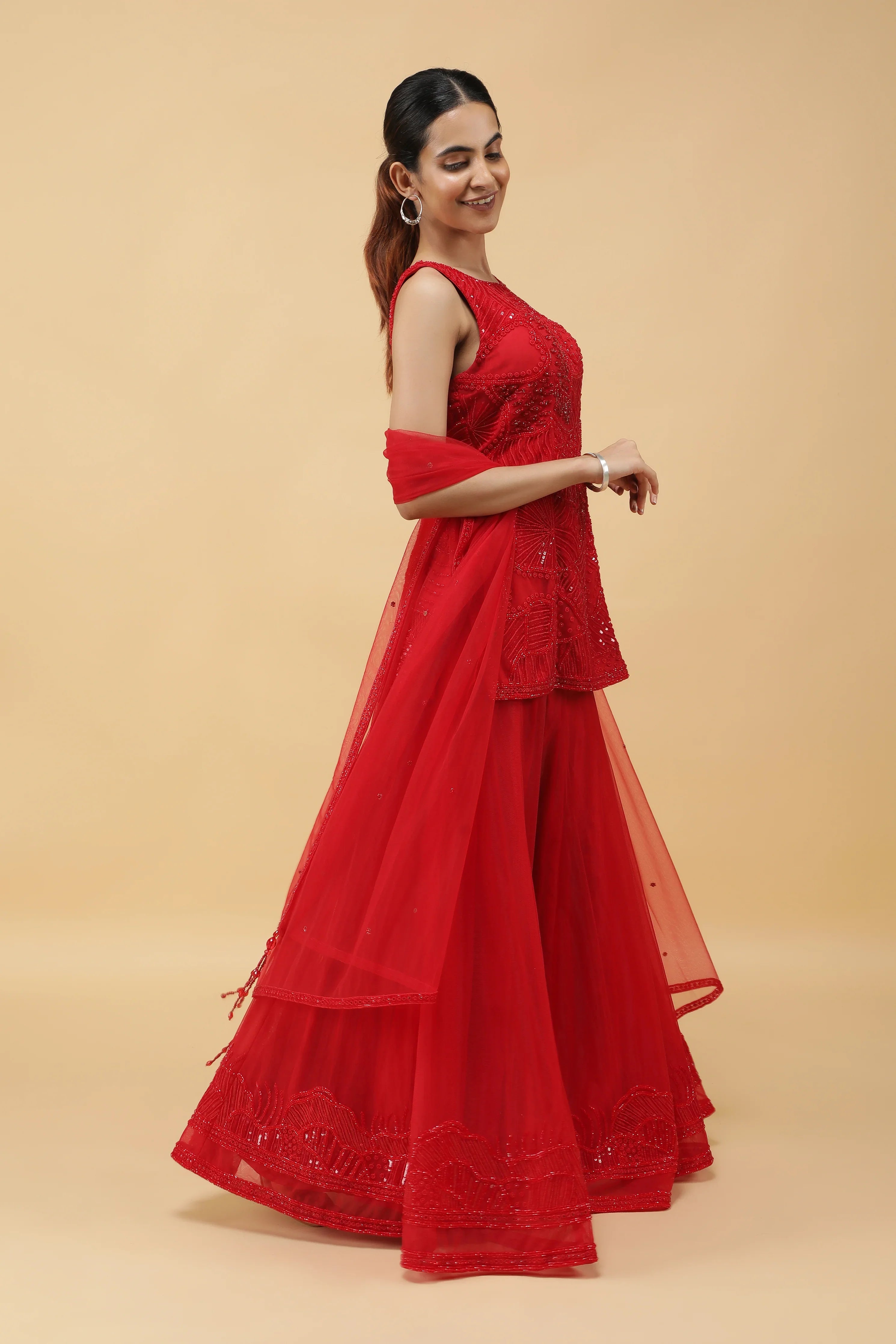 Elegant Red Net Sharara Set with Sequins, Kutdana & Pearl Embroidery - Mokshaa