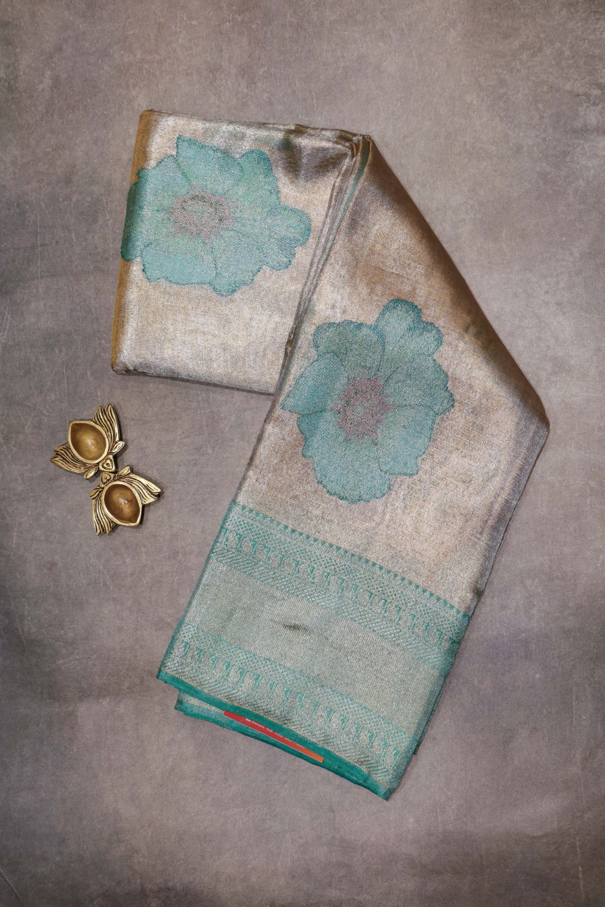 Silver Tissue Silk Saree with Aqua Floral Weaving - Mokshaa