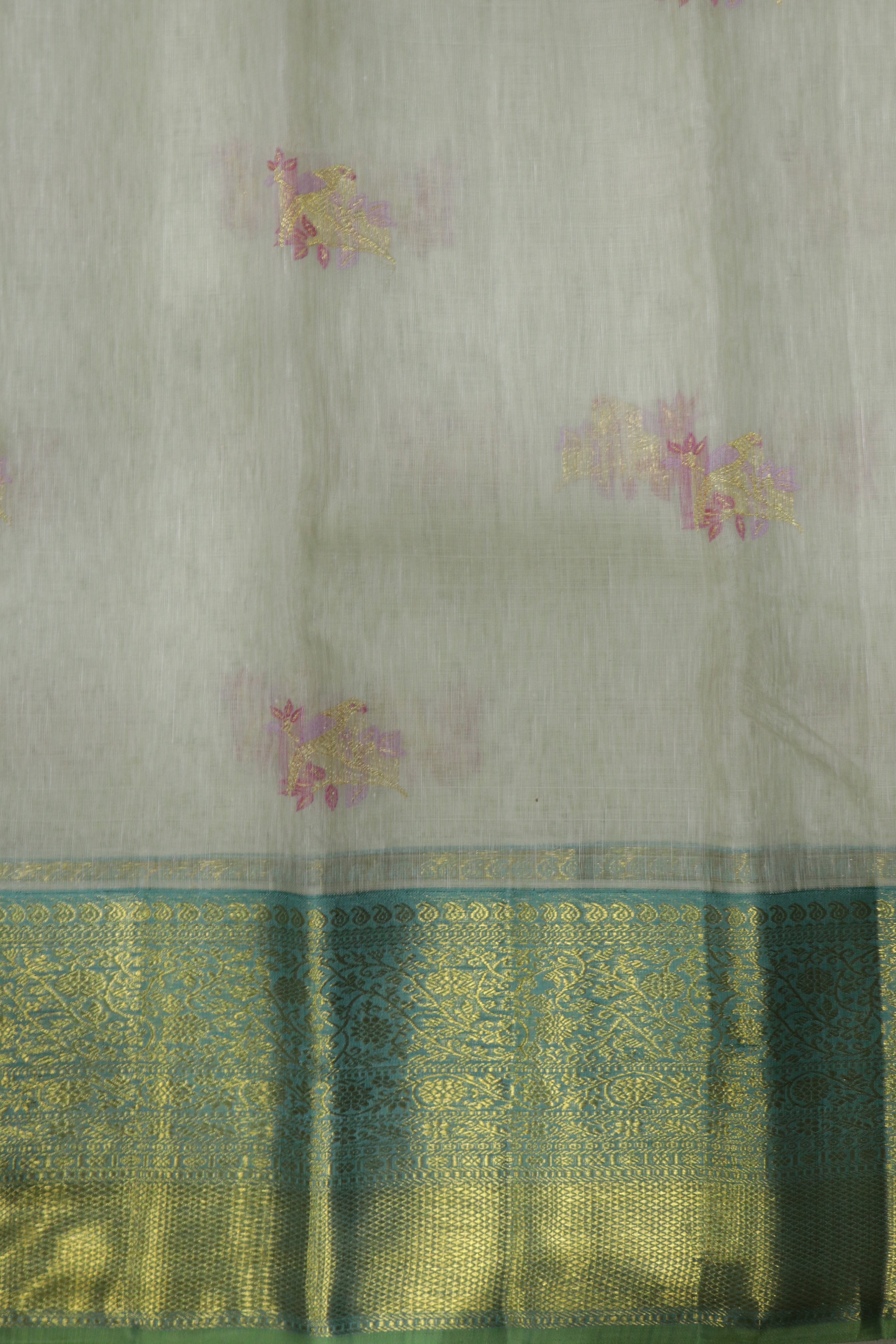 Off White Kanchivaram Silk Saree with Meenakari Parrot Motifs and Contrast Teal Zari Border
