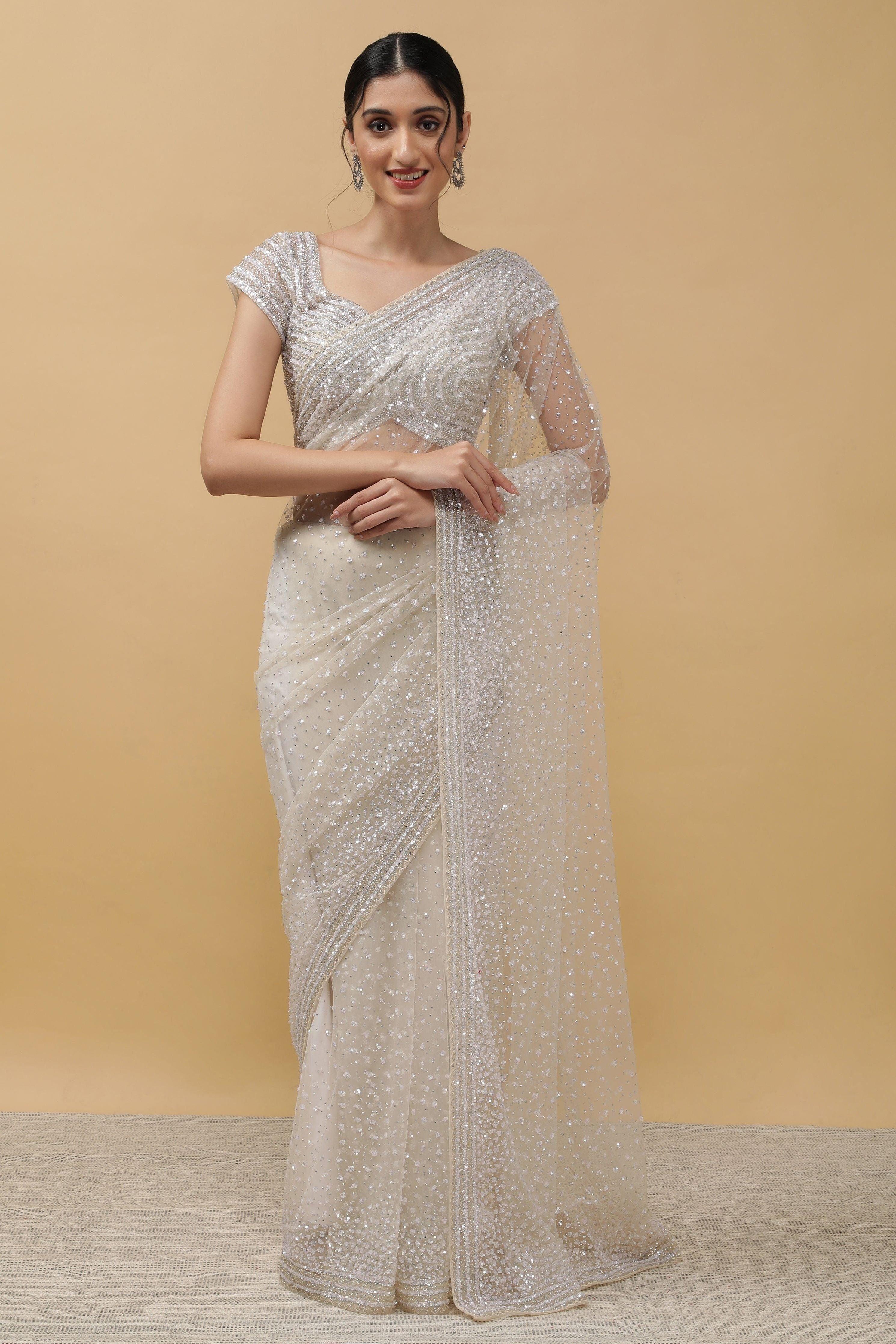 Off White Net Saree With Sequins - Mokshaa