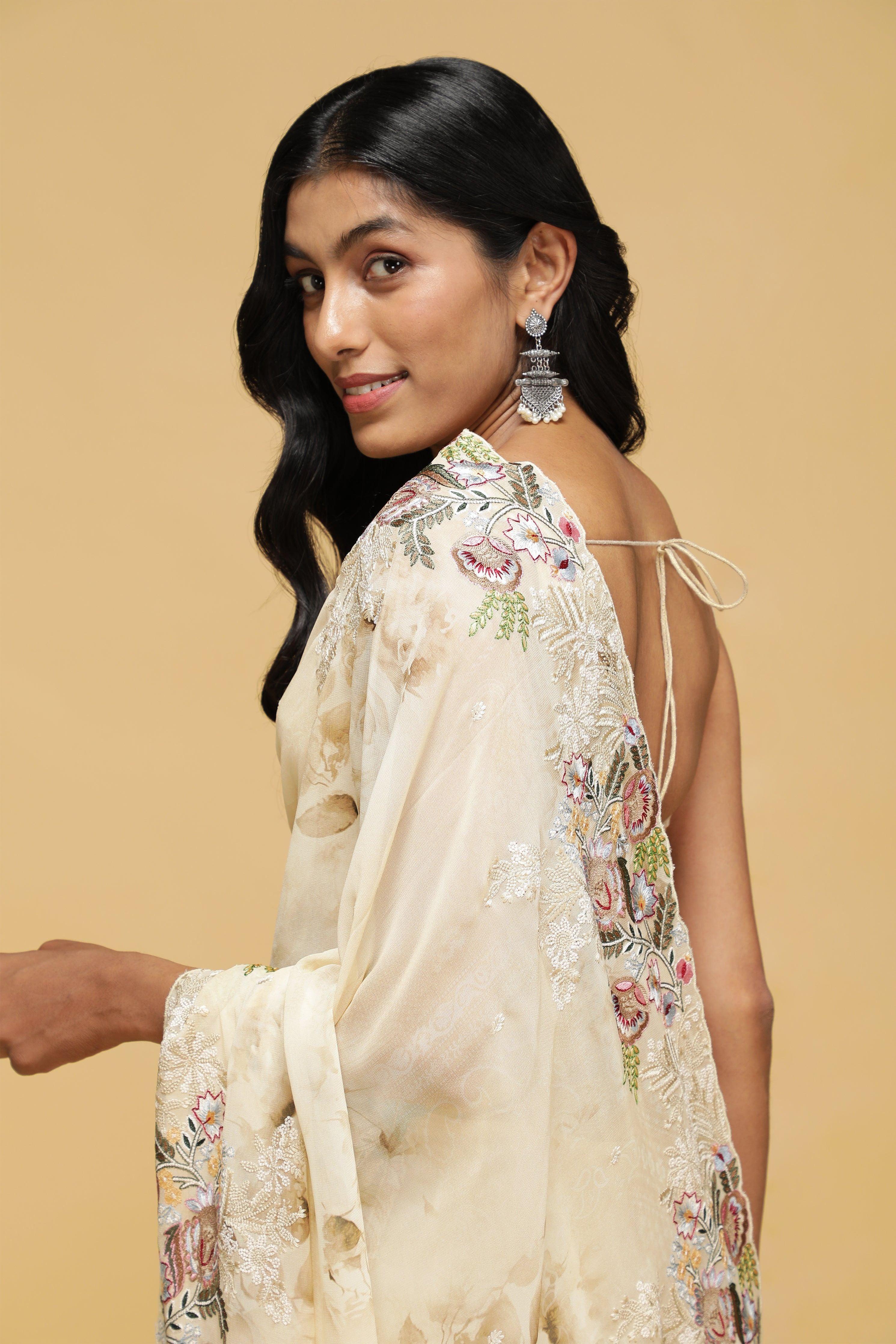 Beige Floral Georgette Saree with Multi-Thread Embroidered Border - Mokshaa