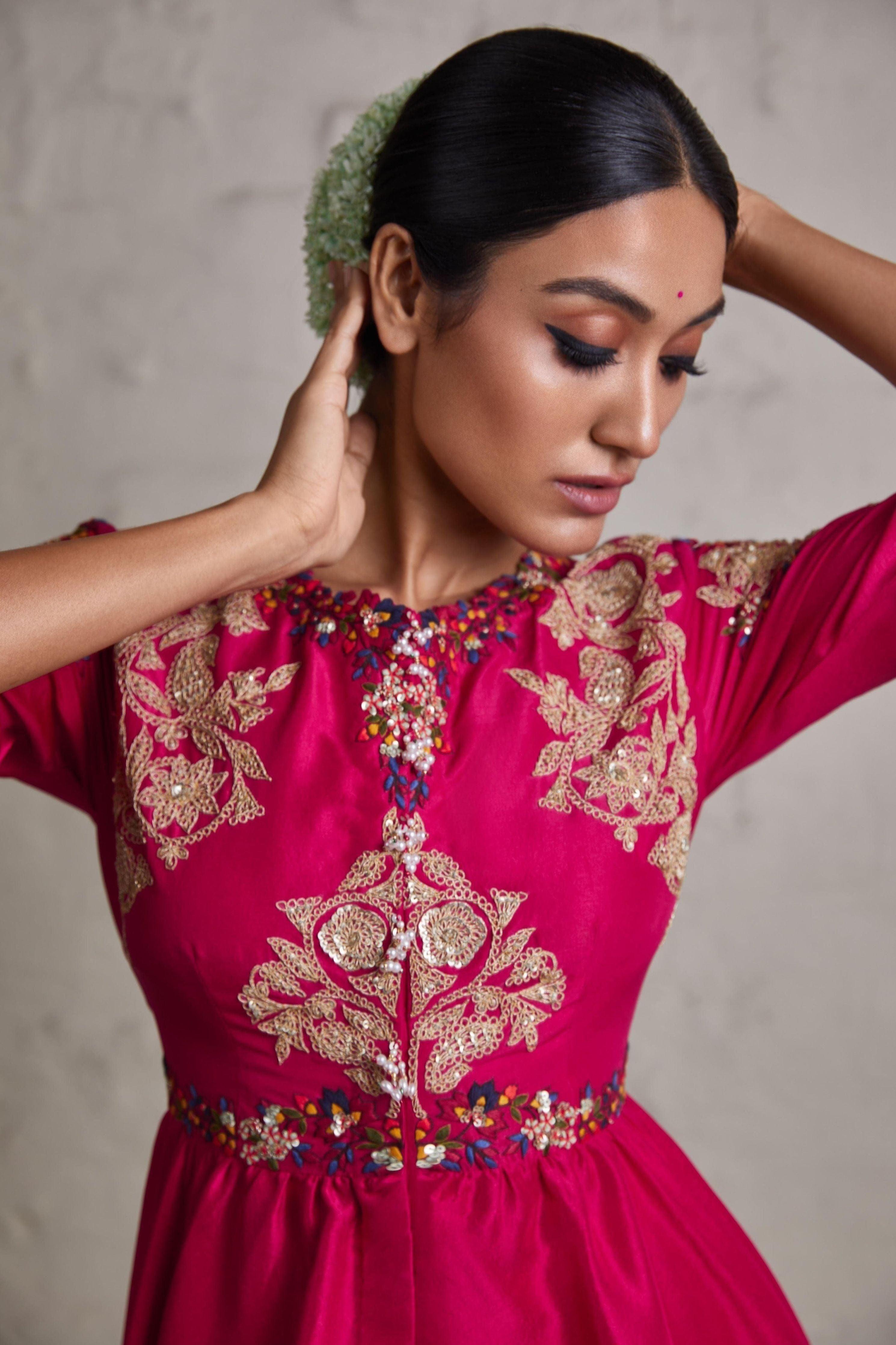 Fuscia Silk Peplum Top With Crepe Dhoti - Mokshaa