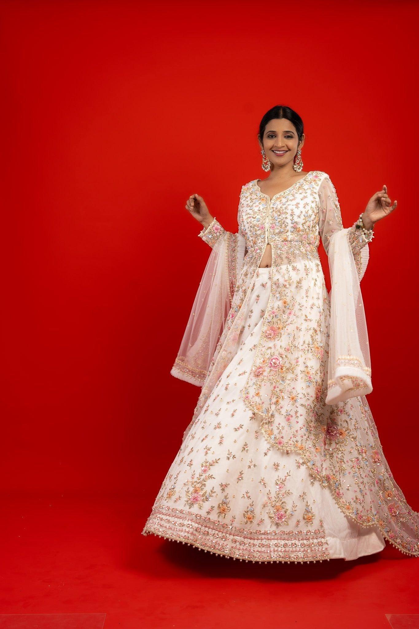Ivory Net Jacket Lehenga with Sequins, Pearl, Stone & Appliqu茅Embroidery - Mokshaa
