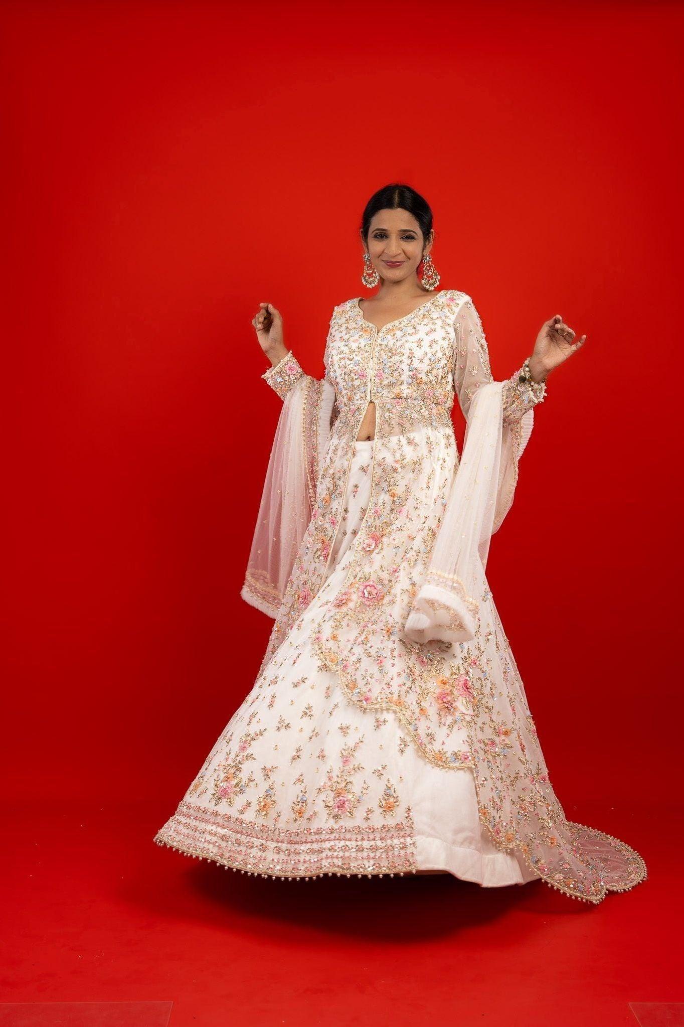 Ivory Net Jacket Lehenga with Sequins, Pearl, Stone & Appliqu茅Embroidery - Mokshaa