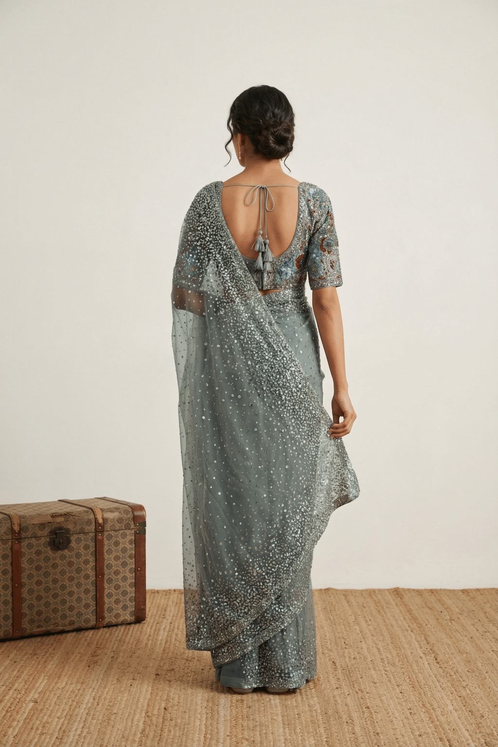 Ice Blue Net Saree with All Over Sequins Work
