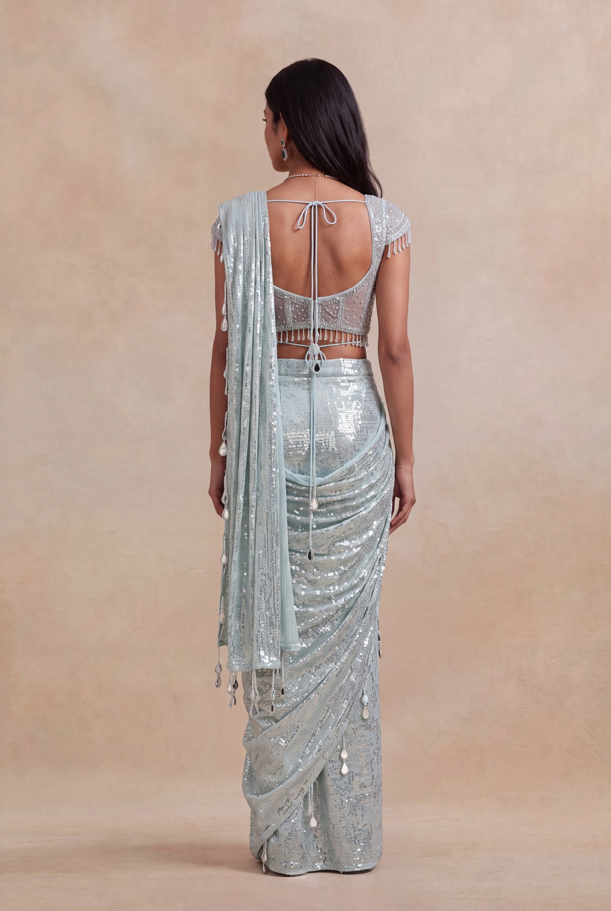 Ice Blue Net Drape Saree with Embellished Corset Blouse - Mokshaa