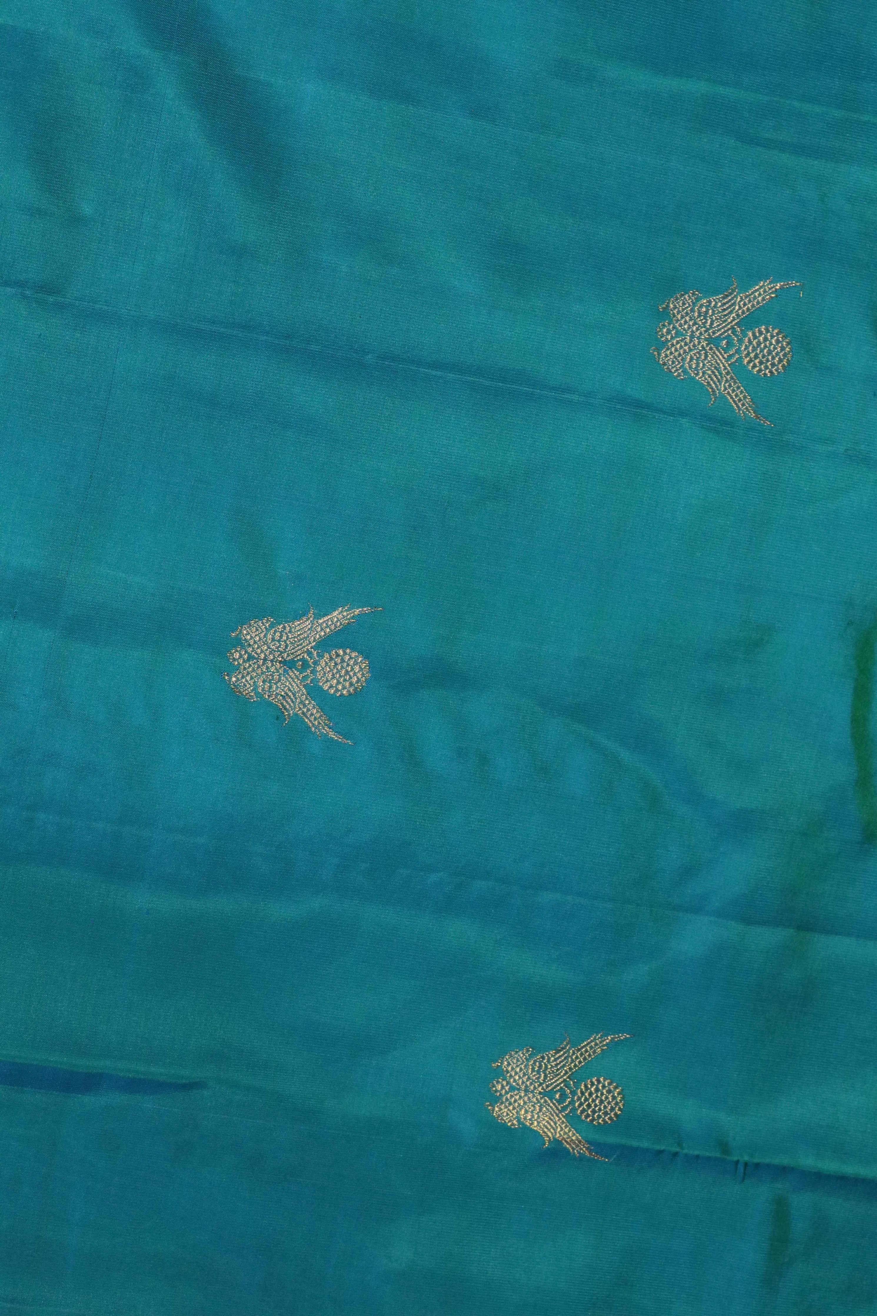 Turquoise Blue Kanchivaram Silk Saree with Fancy Zari Butta - Mokshaa