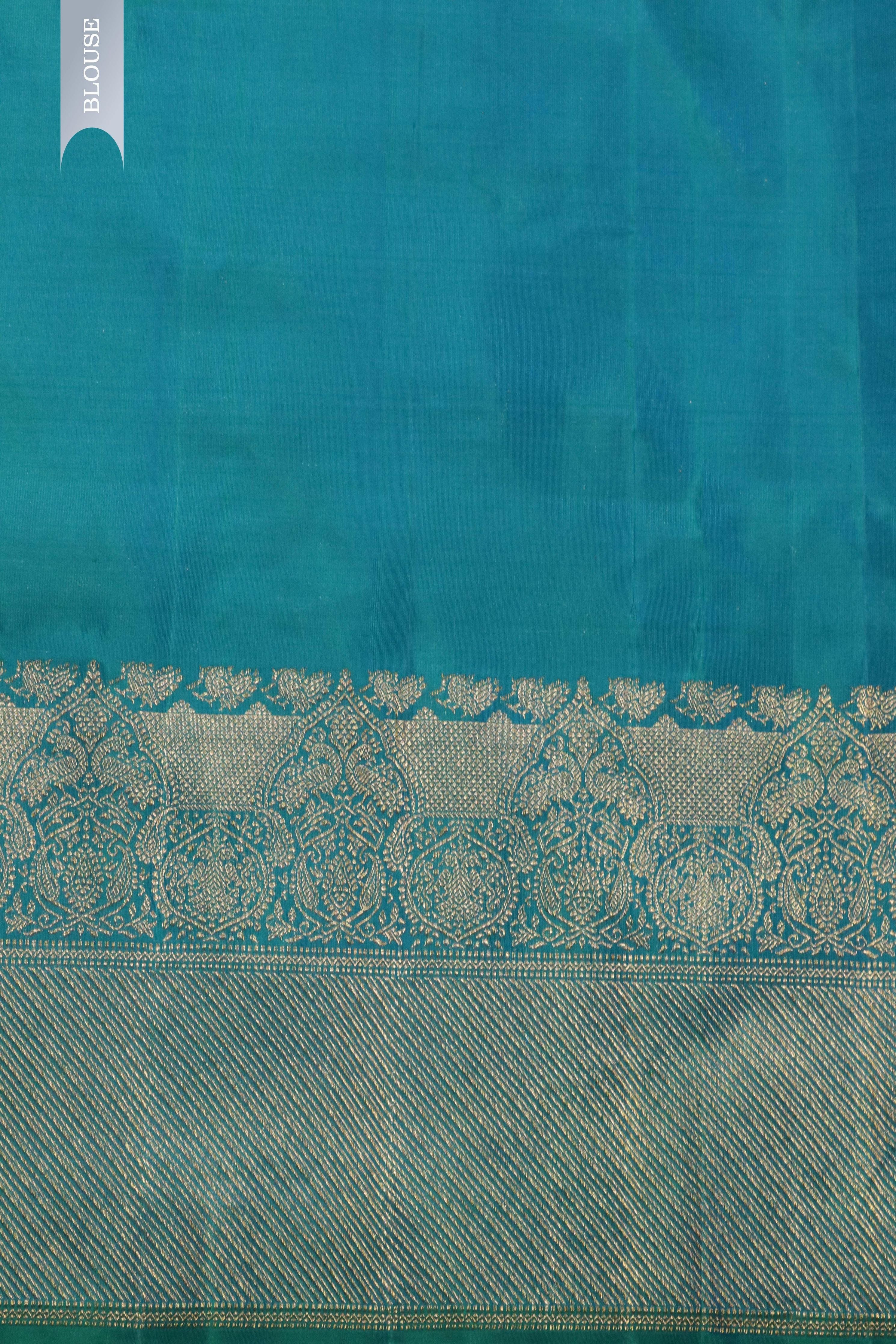 Turquoise Blue Kanchivaram Silk Saree with Fancy Zari Butta - Mokshaa
