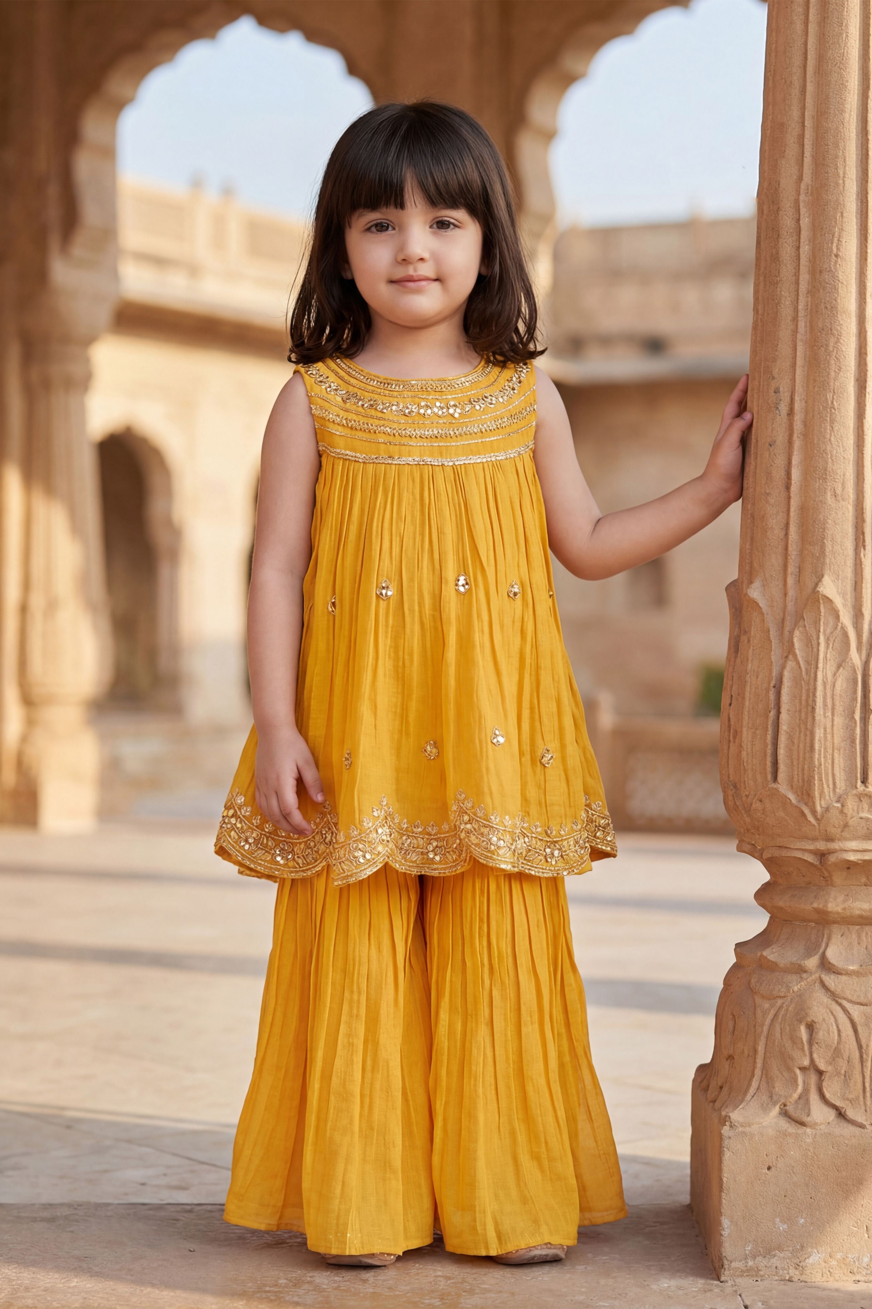 Mustard Yellow Crushed Fabric Mirror Work Kurti & Palazzo Set for Girls