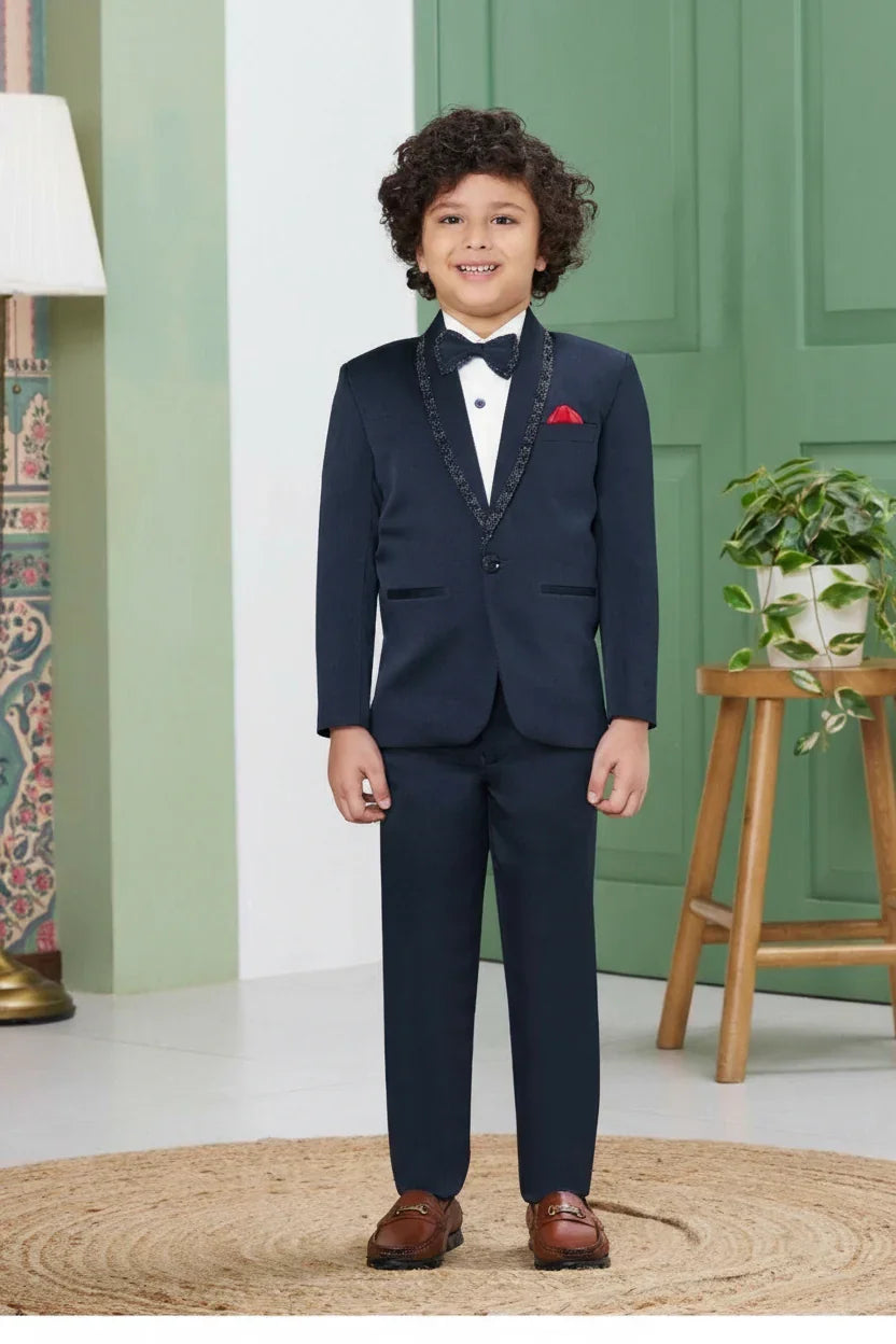 Boys Navy Blue Tuxedo Suit Set with Embellished Lapel and Red Pocket Square - Mokshaa