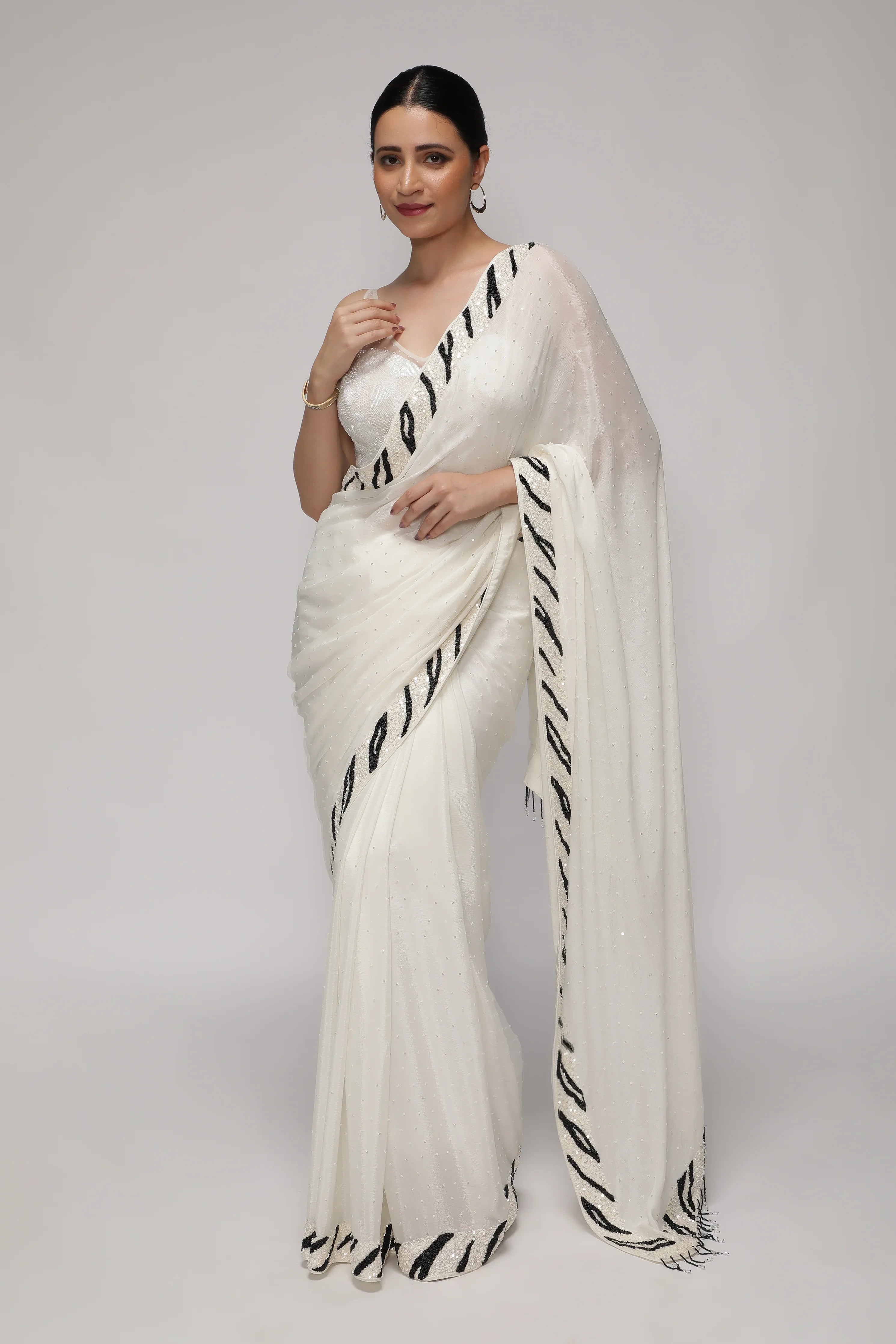 White Crepe Chiffon Saree with Sequins and Beaded Border - Mokshaa
