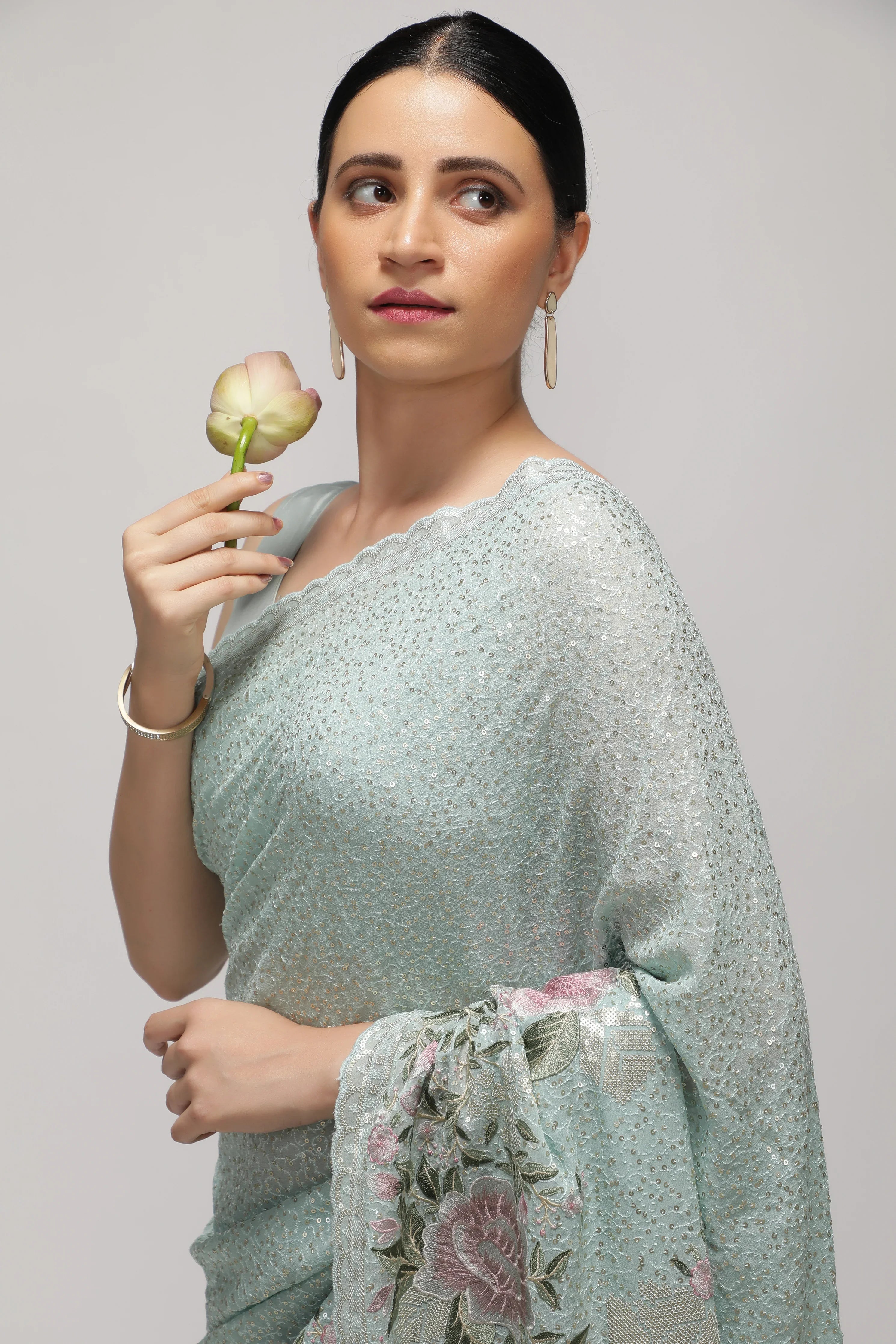Sea Blue Georgette Saree with All-Over Sequins Body & Embroidered Border - Mokshaa