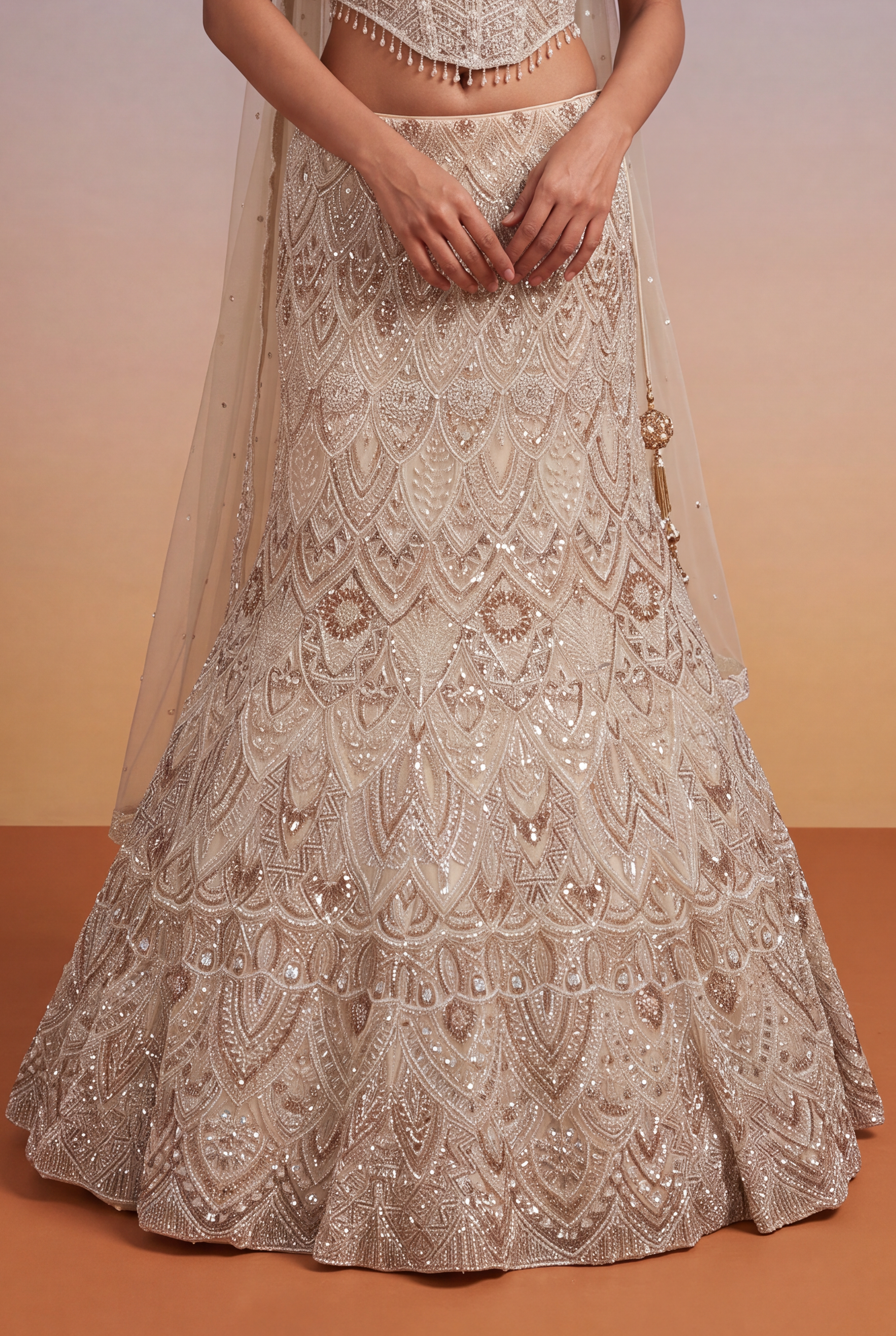 Champagne Net Lehenga with Corset Blouse and Sequin-Kutdana Embroidery